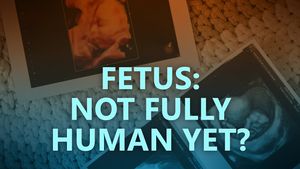 Fetus not fully human yet?