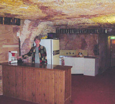 Residents at the opal-mining town of Coober Pedy, Australia, live in caves like this, complete with kitchen, comfortable furniture and modern lighting.