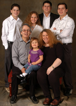 The Suarez family: Paul and Gena in the foreground with Susanna; behind (L to R) Levi, Julia, Luke and Paul Jr.